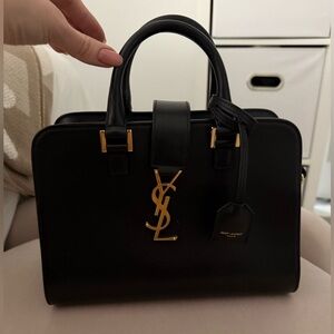 Authentic Saint Laurent calfskin monogram bag in black